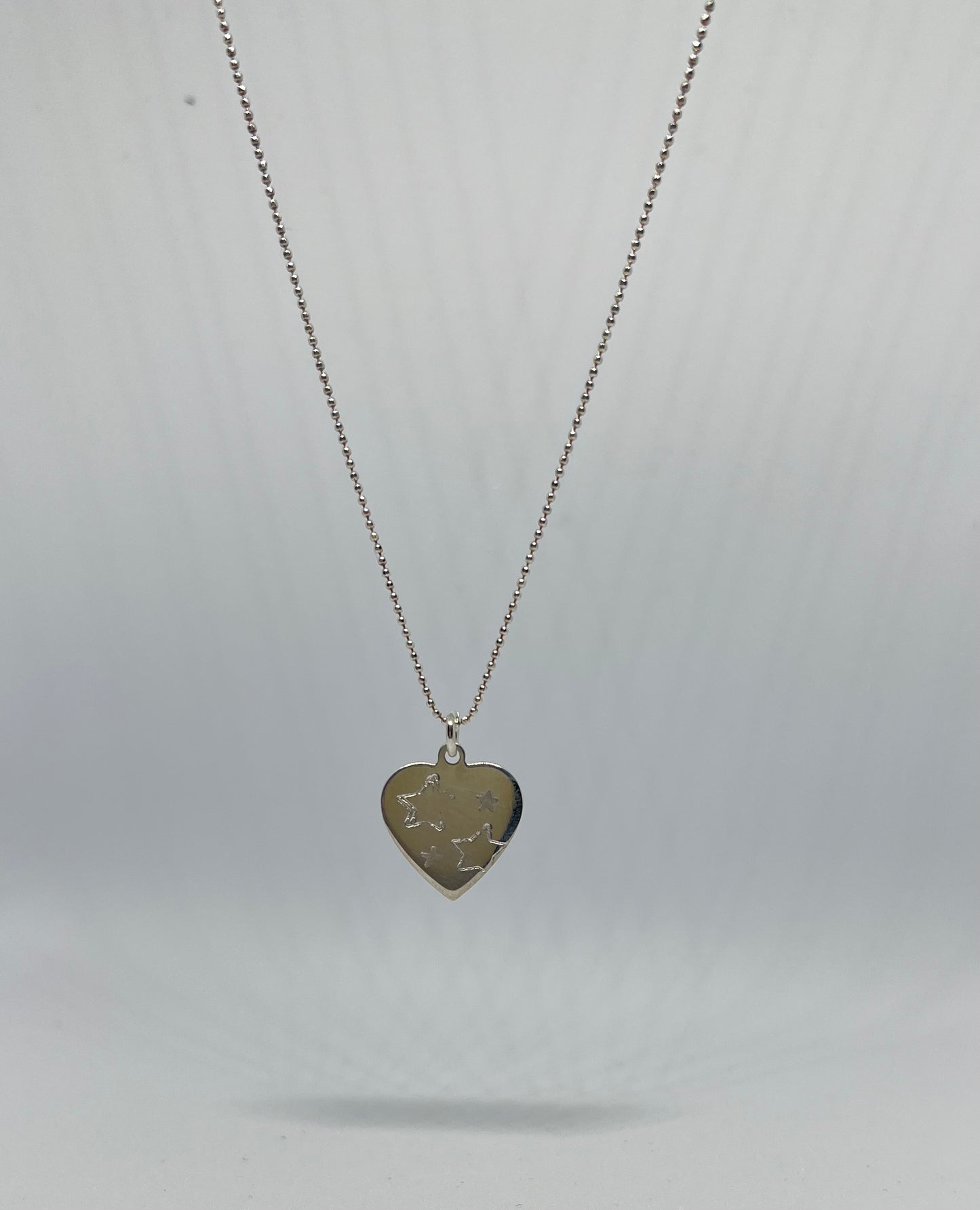 Heart necklace with stars